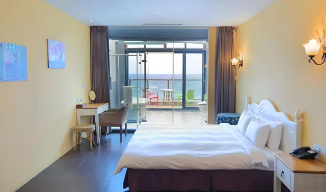 غرفة سوبيريور بسرير كينج بإطلالة على البحر، Jing Guan Hotel 1/1