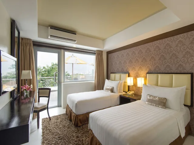 غرفة بريميير بسرير كينج، Quest Hotel Conference Center 3/8