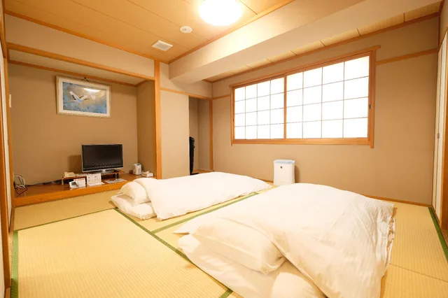 غرفة يابانية بفرشتي فوتون، Matsuyama New Grand Hotel 1/2