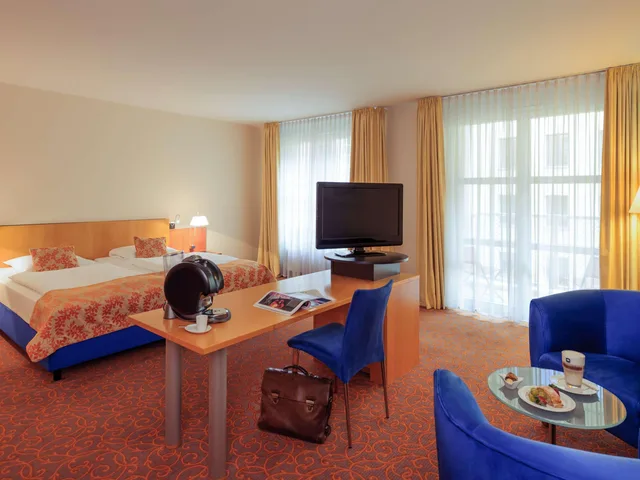 جناح عائلي بغرفتي نوم مع أريكة، Mercure Hotel & Residenz Checkpoint Charli 4/5