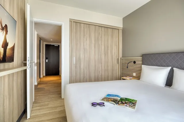 شقة بسرير كوين وسريرين منفصلين بغرفتي نوم مع أريكة، Citadines Arnulfpark Munich 5/12