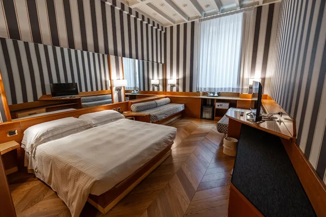 غرفة كلاسيكية رباعية بسرير كوين وسريرين منفصلين، Hotel Sant' Anna 1/10