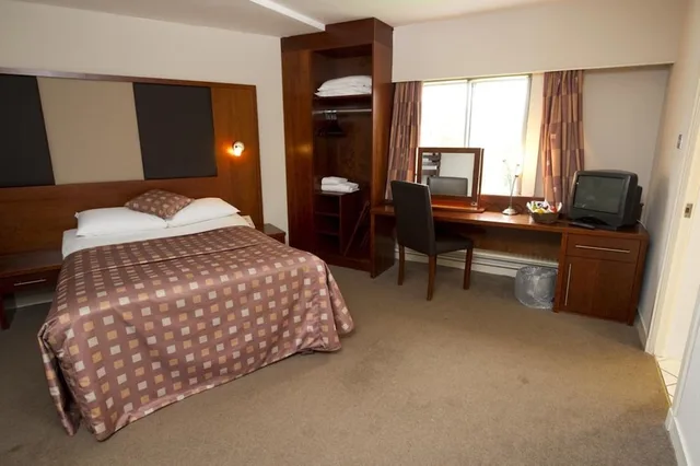 غرفة كبيرة بسرير كينج، Normandy Hotel 1/9