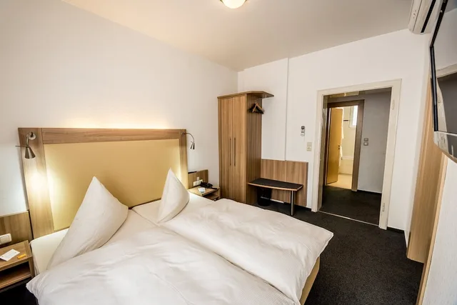 جناح جونيور بسرير كوين مع أريكة، Hotel Lousberg 1/3