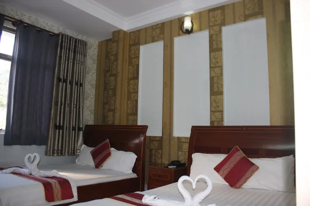 غرفة ديلوكس ثلاثية بسرير كوين وسرير فردي بإطلالة على المدينة، Yoko Airport Saigon Hotel 8/10