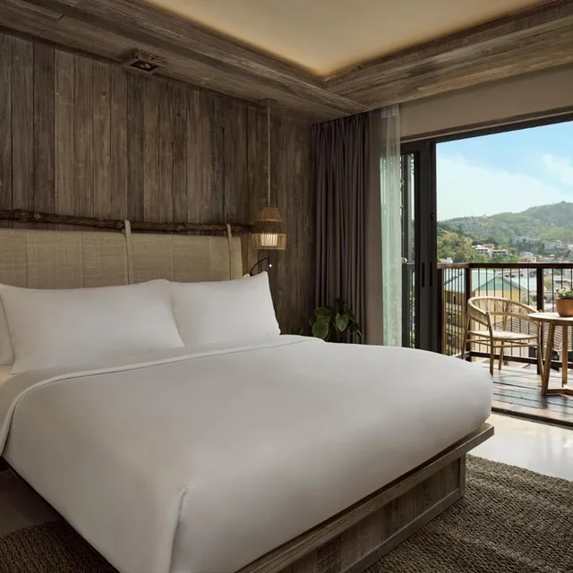 جناح بسريرين منفصلين وسرير كينج بإطلالة على الحديقة بغرفتي نوم، Dinso Resort 2/18