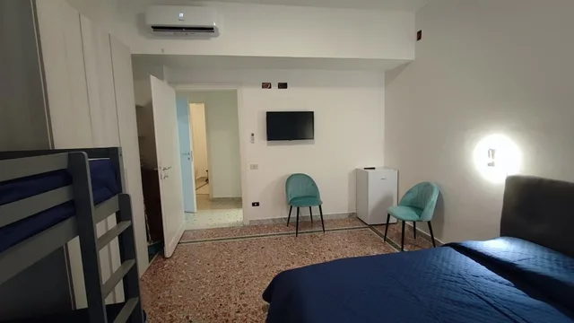 جناح عائلي بسرير كوين وأسرّة بطابقين، Vatican Green Garden 3/5
