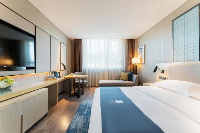غرفة ديلوكس بسرير كوين، Echarm Hotel( Guangzhou Shiqiao Metro Station Zuanhui Square) 1/2