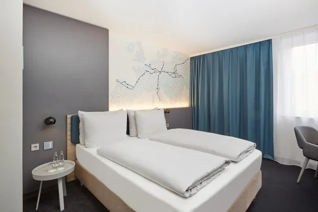 غرفة كومفورت بسرير كينج، H4 Hotel Leipzig 3/10