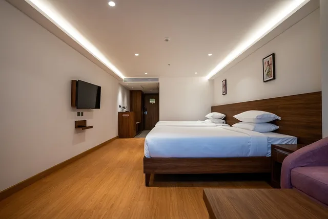 غرفة عائلية بسريرين كوين، Lilac Hotel, Guruvayur 2/4