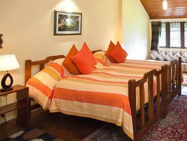 غرفة قياسية بسرير كوين بإطلالة على الحديقة بغرفة نوم واحدة، Ferncliff Bungalow 9/10