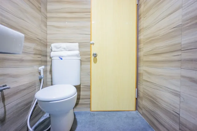 غرفة ديلوكس بسريرين منفصلين، OYO 1636 Wisma Kuta Karang 7/7