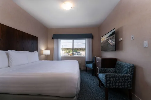 جناح بسرير كينج وسرير كوين مع أريكة بمطبخ صغير، Prestige Cranbrook Hotel, BW Premier Collection 1/5