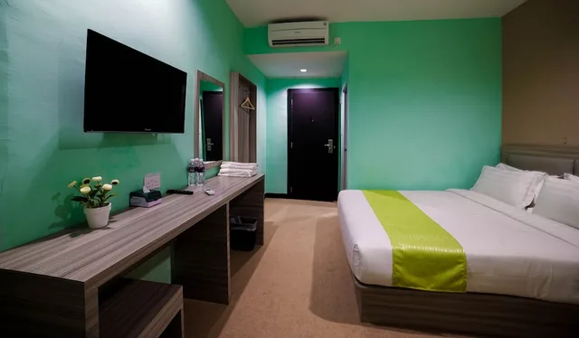 غرفة غراند ديلوكس بثلاثة أسرّة، GREENLAND HOTEL BATAM 3/5