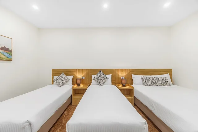 غرفة سوبيريور عائلية بسرير كوين وسريرين منفصلين، WM Hotel Bankstown 1/4