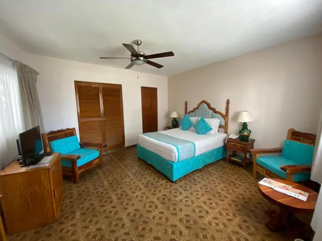 غرفة قياسية بسرير كينج، Hotel Quinta las Flores 2/4