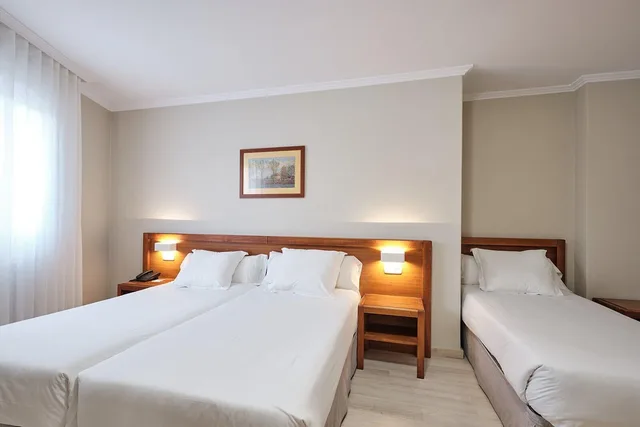 غرفة قياسية ثلاثية بحمام خاص، San Lorenzo Hotel 1/2