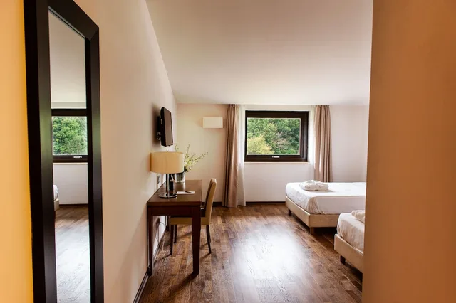 غرفة كومفورت ثلاثية بسرير كوين وسرير فردي، Aqua Montis Resort & Spa 2/4