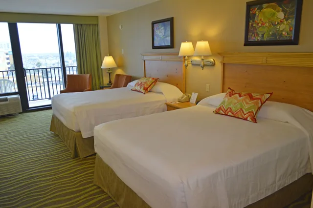 غرفة قياسية بسريرين كوين بإطلالة جزئية على البحر بمطبخ، Nautilus Inn 2/10