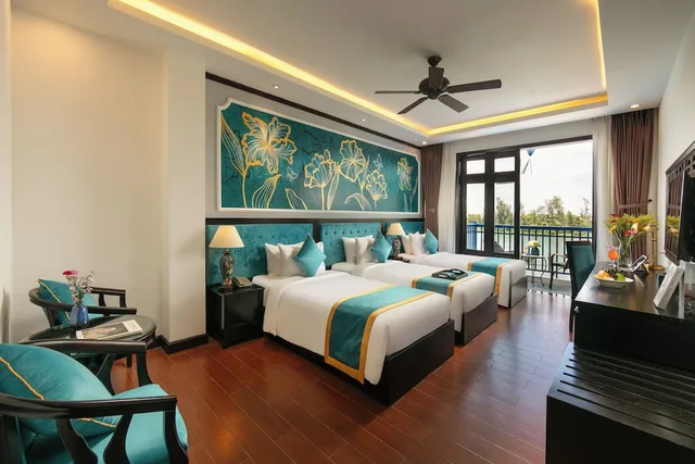 غرفة بريميوم ثلاثية بإطلالة على النهر بشرفة، Silk River Hoi An Hotel & Spa 3/4