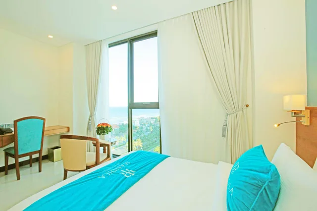 غرفة ديلوكس بسريرين مزدوجين بإطلالة جزئية على البحر، Mandila Beach Hotel Danang 7/10