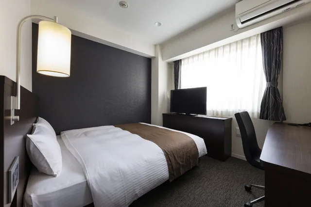 غرفة بسريرين منفصلين تُحدَّد حسب التوفر، KOKO HOTEL Osaka Shinsekai 1/3