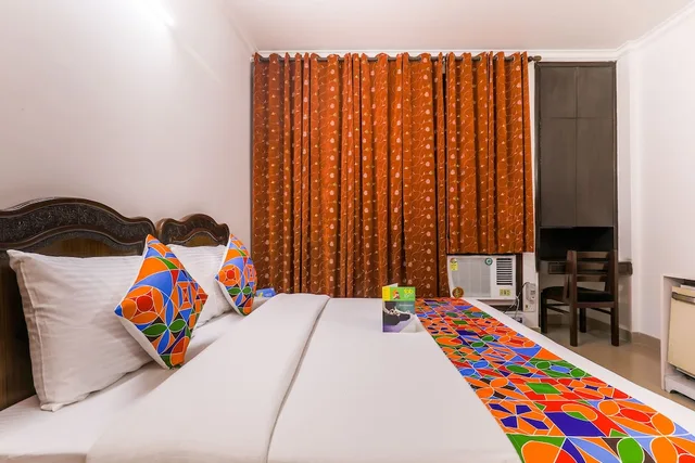 غرفة بريميوم بسرير كوين، FabExpress Hemkunt Mansion 5/8
