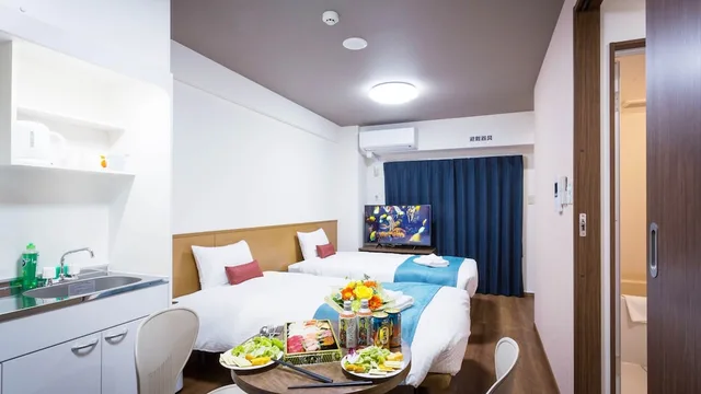 غرفة قياسية بسريرين منفصلين، Kariyushi Condominium Resort Naha Ryujin Hotel Ukishima 3/4