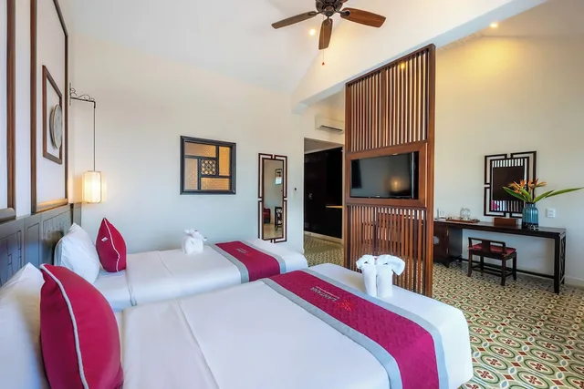 جناح سيغنتشر بسريرين منفصلين بإطلالة على النهر، Lantana Riverside Hoi An Boutique Hotel Spa 1/7