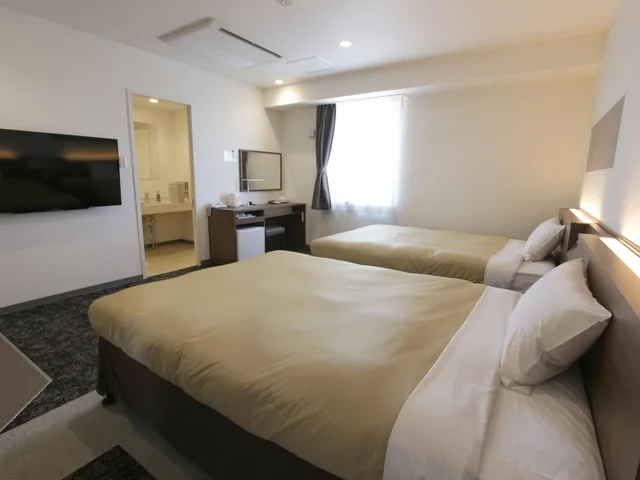 غرفة بسريرين منفصلين للمدخنين، Hotel New Gaea Nishikumamoto Ekimae 1/7
