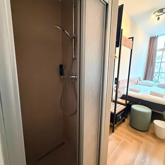 غرفة اقتصادية بسرير مزدوج أو سريرين منفصلين، Continental Hotel 7/8