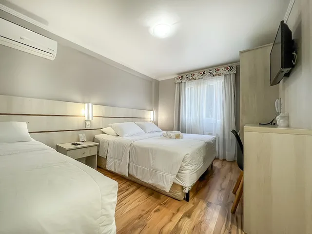 غرفة ديلوكس رباعية بسرير مزدوج وسريرين منفصلين، Pousada Viena 9/10