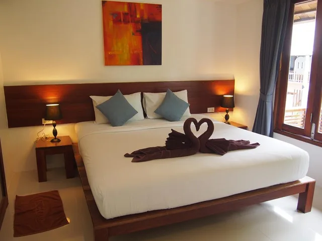 غرفة قياسية بسرير كينج بإطلالة على المسبح، Sairee Cottage Resort 2/2