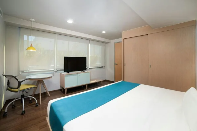 جناح بسريرين منفصلين وسرير كينج بغرفة نوم واحدة مع أريكة، City Express Suites by Marriott Ciudad de Mexico Anzures 6/9