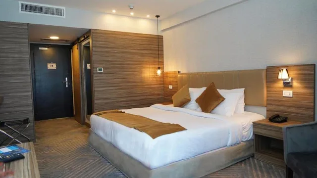 غرفة ديلوكس بسرير مزدوج، MENA Tyche Hotel Amman 1/10