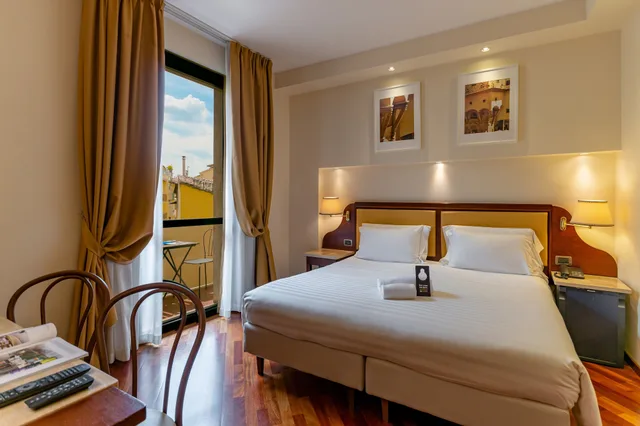 جناح جونيور بسرير كوين مع أريكة، B&B HOTEL Firenze Pitti Palace al Ponte Vecchio 3/7