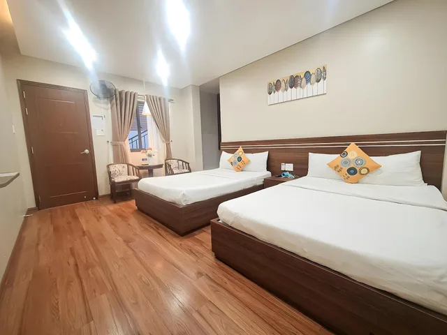 غرفة عائلية بسريرين مزدوجين بإطلالة على الحديقة، QUAN QUAN HOTEL 1/1