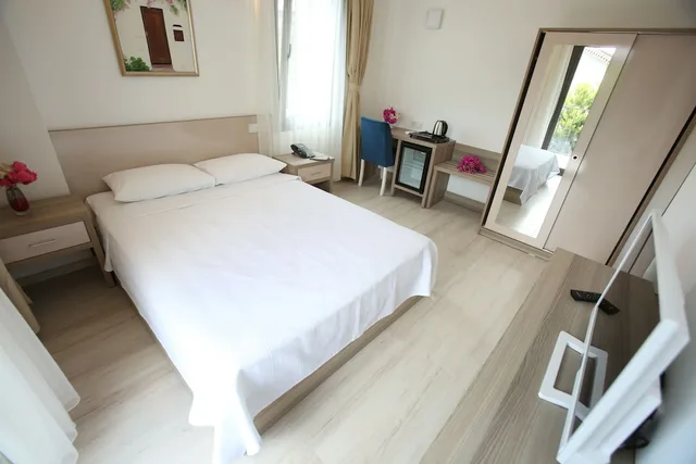 غرفة بسريرين منفصلين بإطلالة على الحديقة والمسبح، Aria Doria Otel 4/10