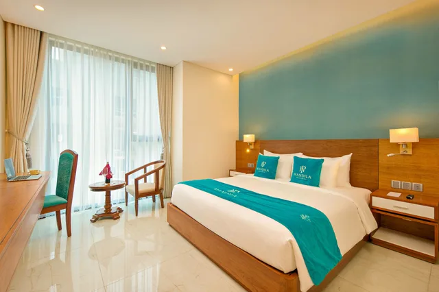 غرفة ديلوكس بسرير كينج بإطلالة جزئية على البحر، Mandila Beach Hotel Danang 5/10
