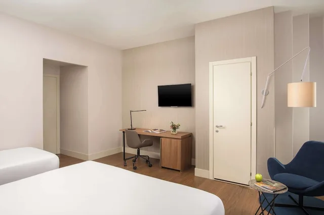 غرفة متصلة عائلية بسرير كوين وسريرين منفصلين، Nh De La Gare Hotel Bologna 3/7