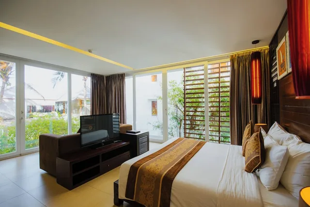 غرفة غراند بريميوم بسرير كينج بإطلالة على الحديقة، Villa Del Sol Beach Villas & Spa 2/10