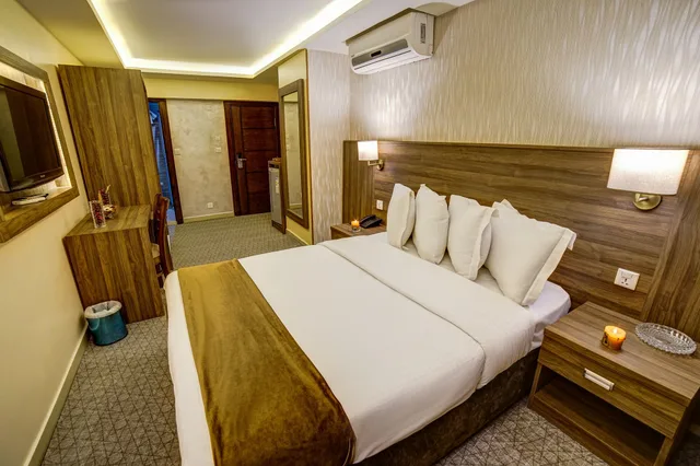 غرفة ديلوكس مفردة بسرير كوين، Nairoukh Hotel Aqaba 1/3