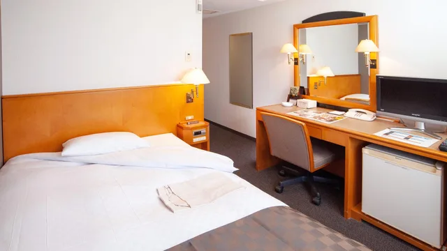 غرفة قياسية مفردة بسرير مزدوج للمدخنين، JR Hotel Clement Uwajima 1/1