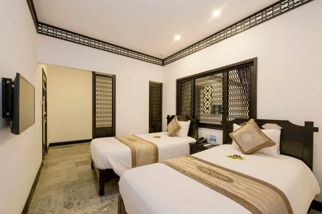 غرفة عائلية بسريرين منفصلين وسرير كينج بإطلالة على المدينة، Hoi An Coco River Resort Spa 8/10