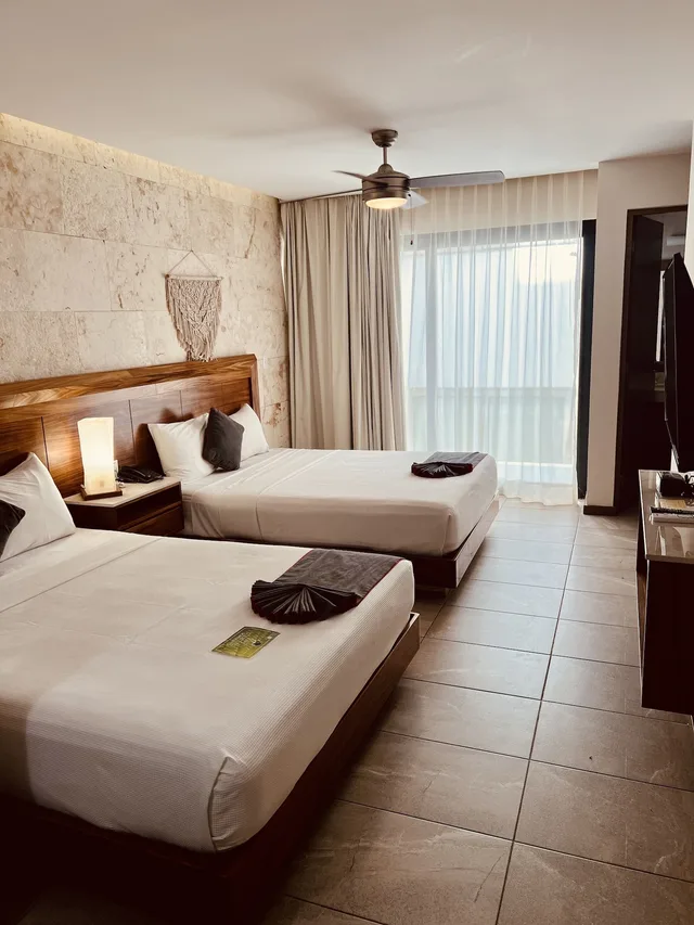 غرفة كومفورت بسريرين كوين مع أريكة، Grand Fifty Suites 6/10