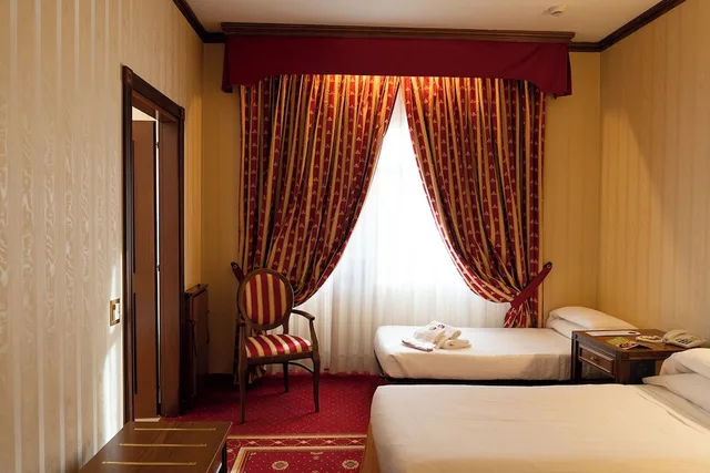 غرفة ديلوكس ثلاثية بسريرين منفصلين، GRAND HOTEL TRENTO 5/6