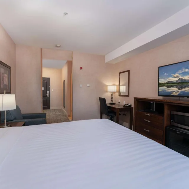 جناح تنفيذي بسرير كينج بغرفة نوم واحدة مع أريكة بمطبخ، Prestige Cranbrook Hotel, BW Premier Collection 2/6