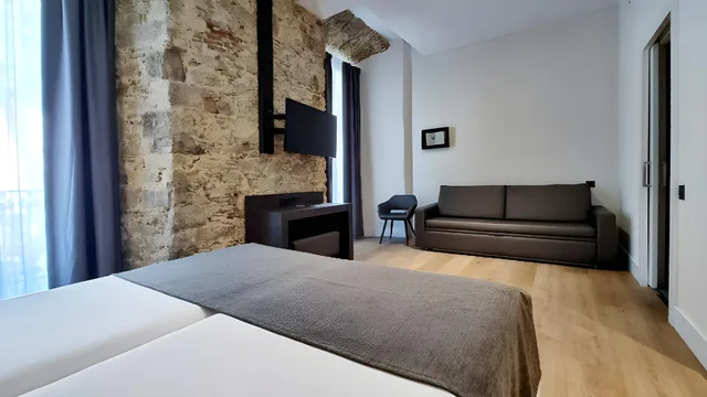 غرفة ثلاثية بسريرين مزدوجين، Sant Agusti Hotel 1/1
