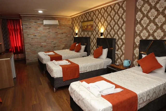 غرفة عائلية بسرير مزدوج وسرير فردي، Adana Saraya Hotel 2/5
