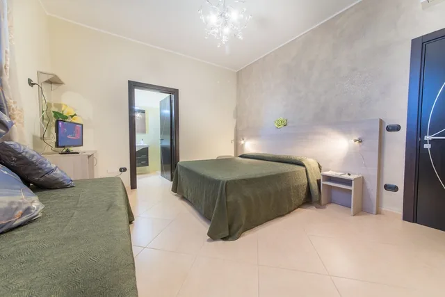 غرفة ديلوكس ثلاثية بسرير كوين وسرير فردي، B&B Rosso Salento 2/5